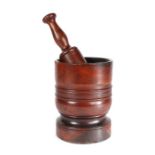 An early 18th century lignum vitae mortar, English, circa 1700-20 Of ring-turned cylindrical form,