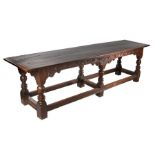 A fine Charles II oak six- leg refectory table, Derbyshire, circa 1660, the fully cleated top of