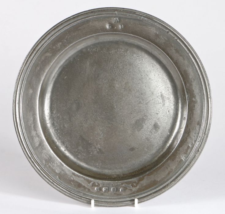 A late 17th century pewter multi-reed rim-plate, English, circa 1685 With hallmarks to front rim and - Image 2 of 2