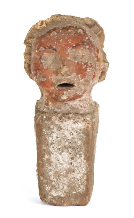 An unusual clay polychrome-decorated 'finial', possibly 16th century, modelled as a child's head