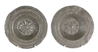 Two 17th century pewter punch-decorated ‘spice’ plates Each having a geometric decorated rim,