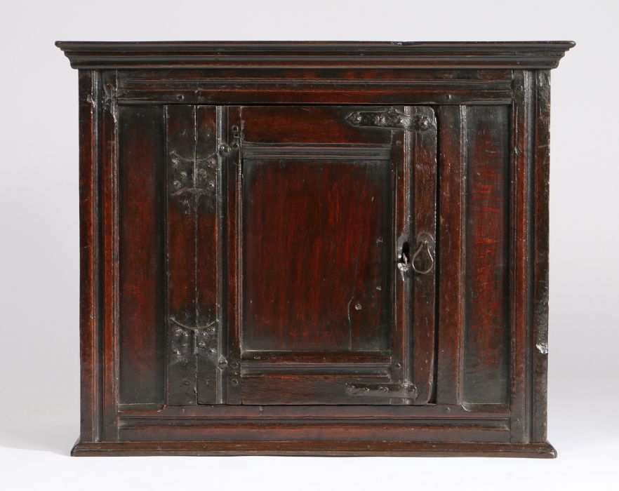 Charles II oak hanging cupboard, circa 1660, the concave cornice above a central panel door - Image 2 of 3