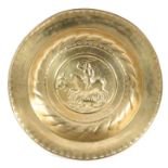 A rare 16th century brass alms dish, Nuremberg, circa 1500-1550 Designed with George and the Dragon,