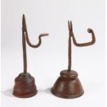 A 19th century wrought iron and oak table rush light holder, of small proportions with iron hinged