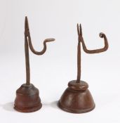 A 19th century wrought iron and oak table rush light holder, of small proportions with iron hinged