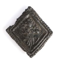A 15th century pewter pilgrim's badge, designed as the standing figure of Henry VI within a diamond