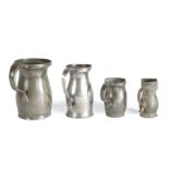 Four pewter lidless baluster measures, English, circa 1800-40 To include a pint example with crowned