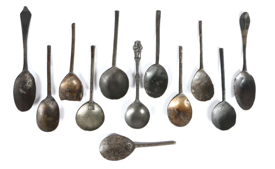 Three late 16th century slip-top spoons, English All with maker’s mark to fig-shaped bowl, largest