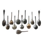 Three late 16th century slip-top spoons, English All with maker’s mark to fig-shaped bowl, largest
