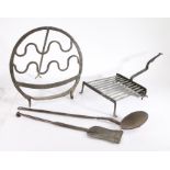 Four 18th/19th century iron cooking utensils, to include: a trivet, a slice, a bread warmer or '