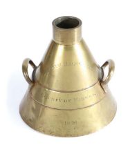 A Victorian brass alloy Imperial Standard measure, the conical body with lug handles and marked '
