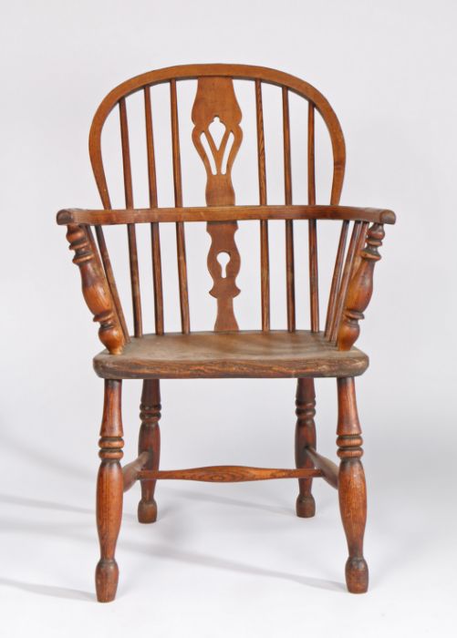 A mid-19th century ash and elm Windsor armchair, circa 1840, the hooped back with pierced splat and - Image 2 of 3