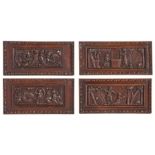 Four late 16th century oak carved panels, Flemish, circa 1580, framed, one designed with ‘The