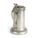 A Charles II pewter Beefeater flagon, circa 1670 OEWS half-gallon, the plain tapering drum with a