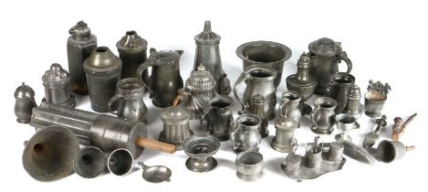 A miscellaneous group of mostly 19th century pewter To include ice moulds, pepperette, Welsh hat,
