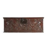 A Charles I boarded oak document box, circa 1630, the rectangular top with chip carved edges, the