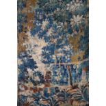 A 17th century verdure tapestry panel, Flemish Woven in coloured wools with silk highlights,