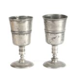 A near pair of 18th century pewter chalices, London, circa 1730 Of Pint Old English Ale Standard,
