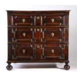 A Charles II joined oak chest of drawers, circa 1680 Having a twin-boarded top with ovolo-moulded
