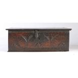A Charles II oak boarded box, with original lining paper, West Country, circa 1660 The single-piece