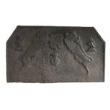 A good cast iron fire back, probably mid-16th century, Weald, Sussex, of rectangular form with