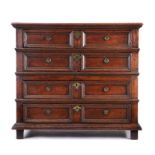 Charles II oak geometric chest of drawers, circa 1680, the rectangular top above four long moulded