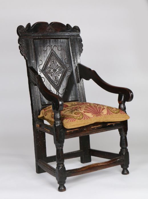 Charles II joined oak panel-back open armchair, Yorkshire, circa 1670, the back panel carved with - Image 6 of 6