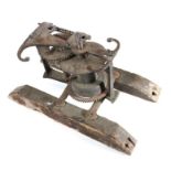 A mid-18th century steel weight driven spit jack, the decorative front plate with  two hearts and