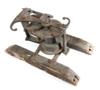 A mid-18th century steel weight driven spit jack, the decorative front plate with  two hearts and