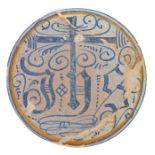 A 15th century tin-glazed earthenware plate, Hispano-Moresque, circa 1450, designed with a large