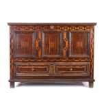 A good and striking Charles II oak and inlaid chest with drawer, dated 1663, Yorkshire, in the late