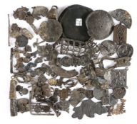 A large collection of Medieval pewter pilgrim's badge fragments, together with a 17th century toy