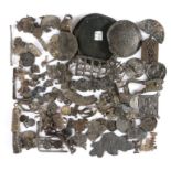 A large collection of Medieval pewter pilgrim's badge fragments, together with a 17th century toy