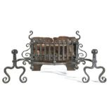 An iron fire basket, the basket having a bowed front of upright bars, on scrolling andiro-style