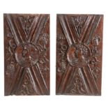 A pair of unusual mid -16th century oak Romayne-type panels, one centred with roundel enclosing a