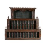 A rare mid-17th Century oak three-tier mural livery cupboard, or glass case,  English ,circa 1650,