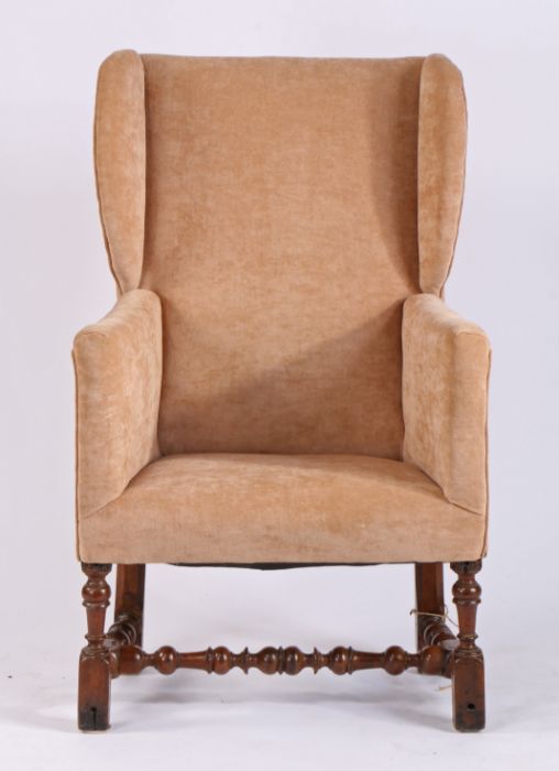 An 18th Century walnut and upholstered wing armchair, the shallow back, sides and  stuff-over seat - Image 2 of 2