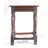 A Charles II oak joint stool, circa 1660, having a rectangular top with simple moulded edge,  run-