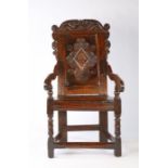 A striking Charles II joined oak and inlaid panel-back open armchair, Leeds, Yorkshire, circa 1670