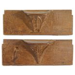 A pair of large mid-15th century oak misericords, circa 1450 Each ‘seat’ corbel carved with paired