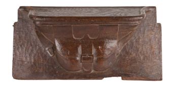 A rare early 16th Century oak misericord, circa 1520, designed as a medieval pilgrim's belted