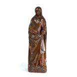 A 15th century carved oak figure, probably Saint Catherine, North European.   With flowing hair,