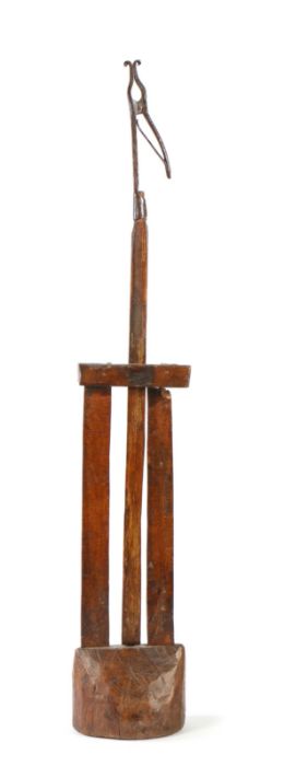 An 18th century floor standing peerman, with iron rush light scroll-ended nips, adjustable height