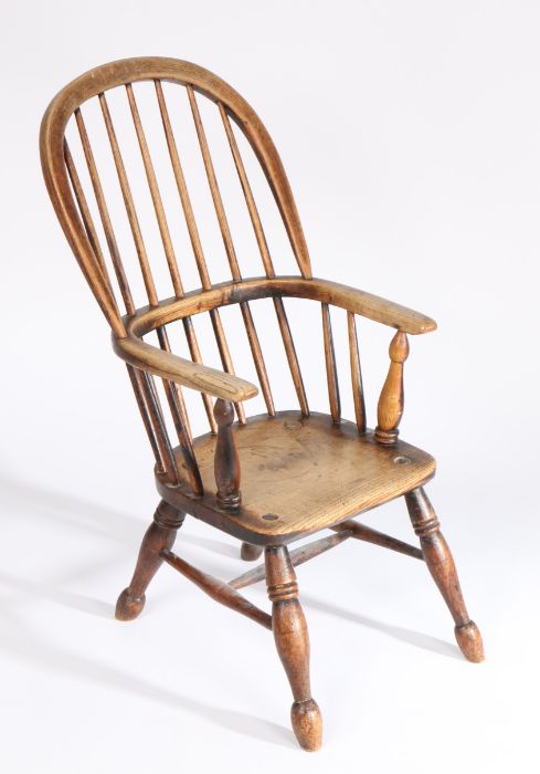 A mid-19th century ash and elm child's Windsor armchair, with hooped spindle -filled back, saddle - Image 3 of 3