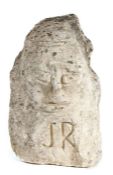 A carved 'limestone' head, possibly Anglo-Saxon, 5th -6th century, worn feature, linear defined