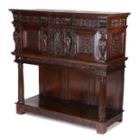 An Impressive and rare Elizabeth I joined oak standing livery cupboard, circa 1600, having a