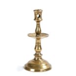 A late 16th century brass Heemskerk-type candlestick, Dutch, circa 1580, the socket with circular