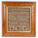 A George IV  needlework sampler, by Ann Wyles 1829, with alphabets and numbers above a short line