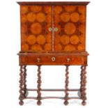 A highly impressive late 17th century olivewood oyster-veneered cabinet-on-stand, English, circa