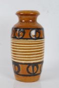 1960's West German pottery vase, moulded with white lines and painted with black on a brown